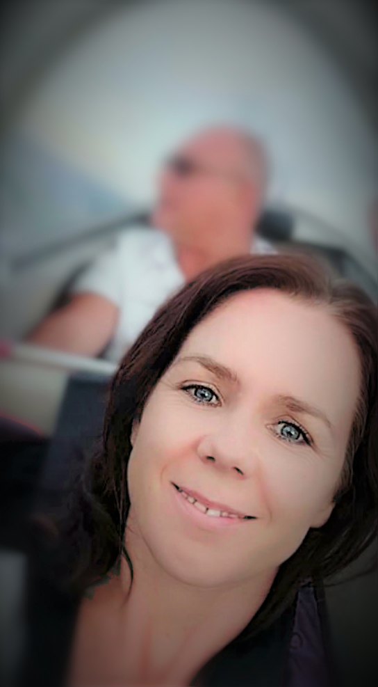 Marta Nowak-Kulpa in a glider cockpit, with the pilot behind her